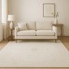 Cool-toned contemporary area rug styled in a modern room