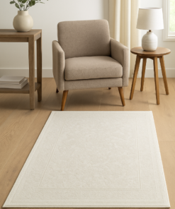 Neutral-toned rug styled in a cozy contemporary space