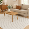 Contemporary rug styled in a neutral-toned living room