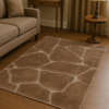 Modern neutral rug styled in a contemporary space