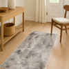 Small elegant rug styled in a traditional entryway