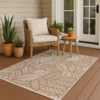 Weather-resistant rug styled in a patio or entryway